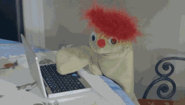 Puppet Funny GIF - Puppet Funny Working On Computer GIFs