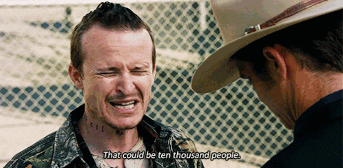 a man with a tattoo on his neck is talking to another man in a cowboy hat and says that could be ten thousand people