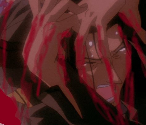 a close up of a person 's face with blood coming out of his mouth