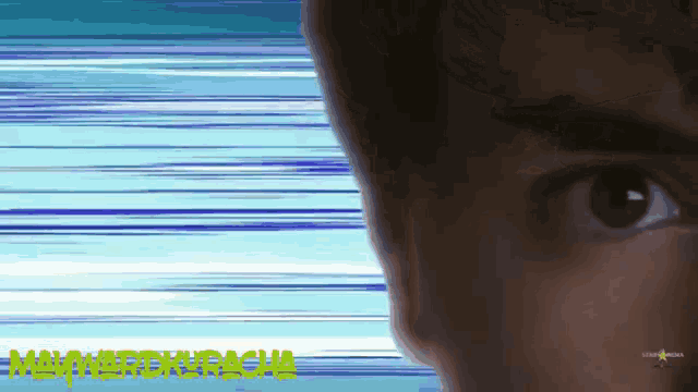 a close up of a man 's eye with the word racha on the bottom left
