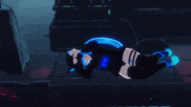 a video game character is laying on the floor with glowing blue lights around her