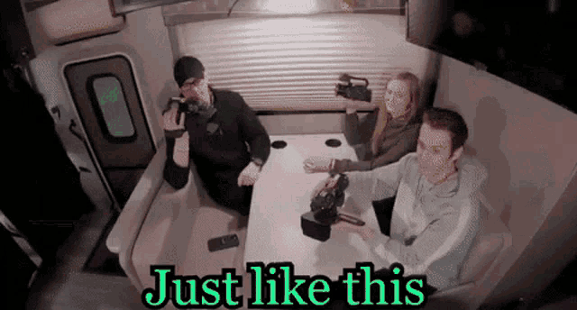 a group of people sitting around a table with the words just like this written on the bottom