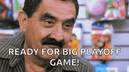 a man with a mustache has the words ready for big playoff game on his face