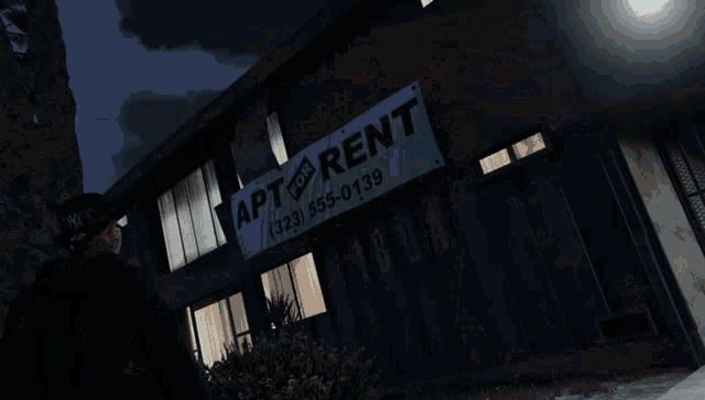 a building with a balcony and a door that says ' n. ' on it
