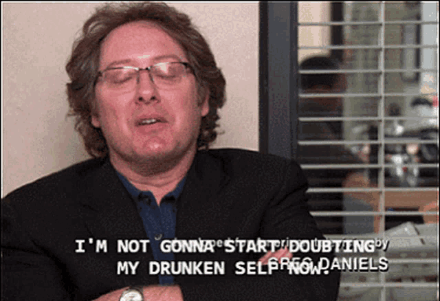 a man wearing glasses and a suit says " i 'm not gonna start doubting "