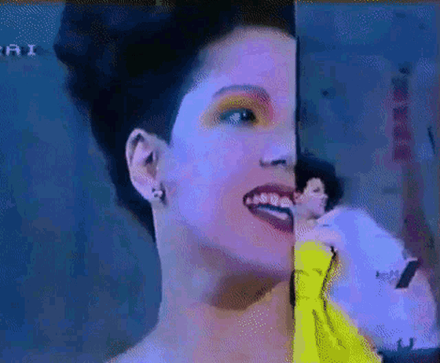 a woman 's face is split in half and the word ai is on the bottom left