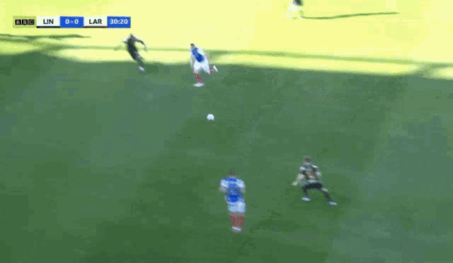 a soccer game between lin and lar is going on