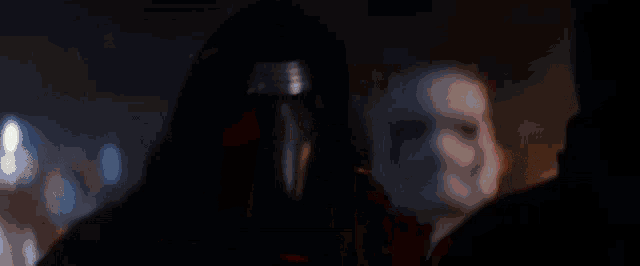 a close up of a person 's face with a flame coming out of it 's mouth