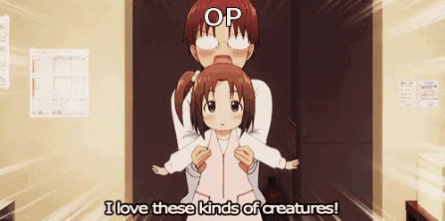 a man is holding a little girl and says i love these kinds of creatures .