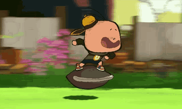 a cartoon character with the letter c on his chest