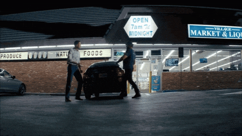 a store front with a sign that says open 7 am to midnight