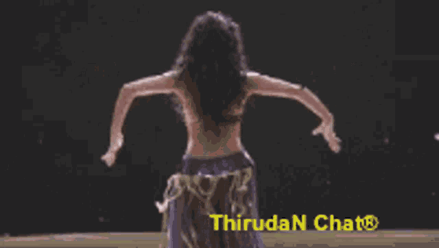 a woman is dancing in front of a sign that says thirudan chat
