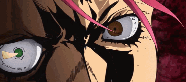 a close up of a cartoon character 's eye with a green eye