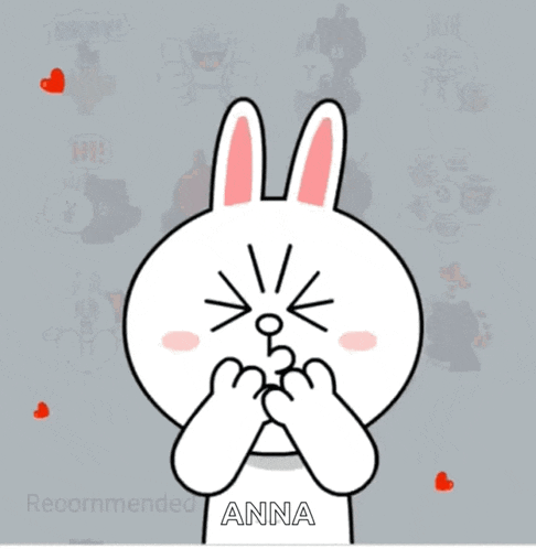 a cartoon bunny holding a red heart with the name anna written on it