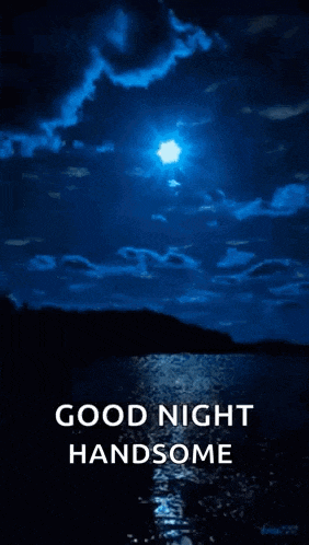 a picture of a full moon over a body of water with the words `` good night handsome '' written below it .
