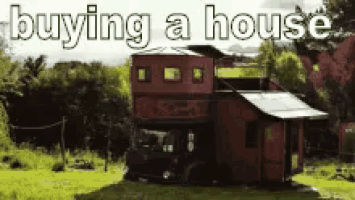 a picture of a house with the words " buying a house " above it