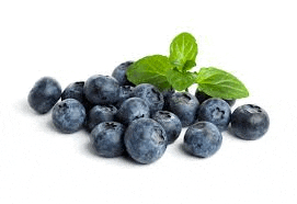 a pile of blueberries with leaves on a white background .