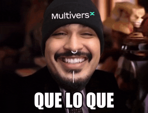 a man with a beard wearing a beanie that says multivers on it