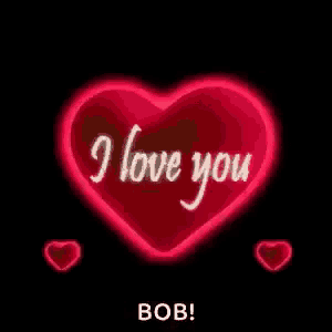 a red heart with the words `` i love you '' written on it .