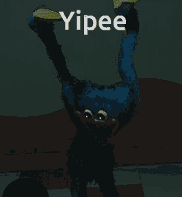 a blue monster with the word yipee written on it