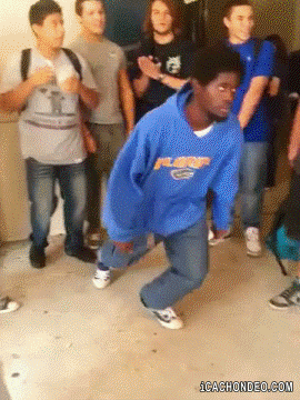 a man in a blue hoodie with the word florida on it is dancing