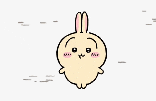 a cartoon drawing of a bunny rabbit with a smile on its face .