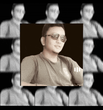 a black and white photo of a man wearing sunglasses and a shirt that says ' ashot ' on it