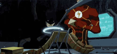 a cartoon of the flash sitting in front of a screen