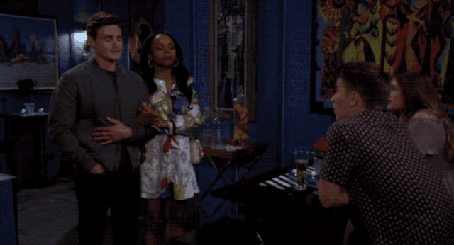 a man and a woman standing next to each other