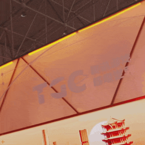 a sign that says tsc on it with a picture of a pagoda in the background