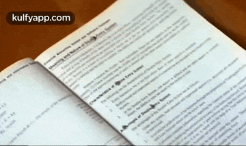 a book is open to a page that says kulfapp.com on the bottom