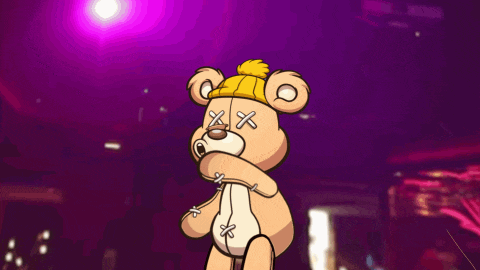 a teddy bear wearing a yellow hat with crosses on his eyes