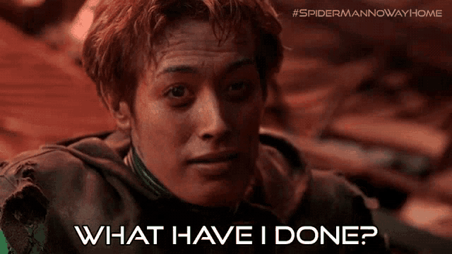 a poster for spider-man no way home shows a man with red hair asking what have i done