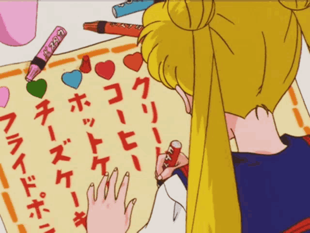 a girl is writing on a piece of paper with hearts on it and a marker that says ' lucky '