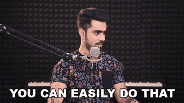 a man is singing into a microphone in front of a piano and the words `` you can easily do that ''
