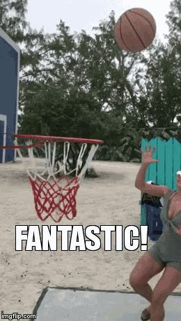 a woman is throwing a basketball into a basketball hoop with the words fantastic on the bottom
