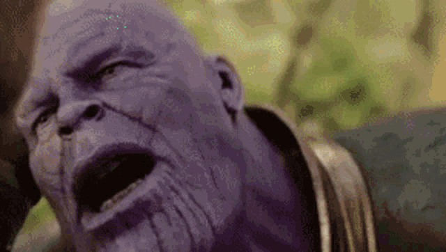 a close up of thanos ' face in avengers infinity war .