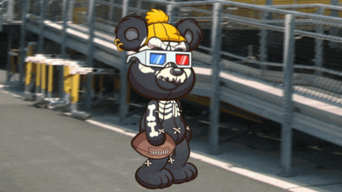 a black teddy bear wearing 3d glasses and a yellow hat