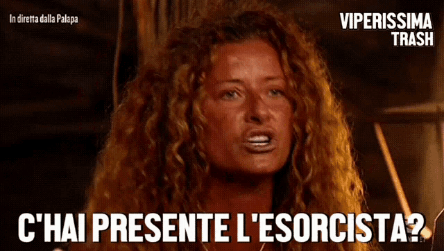 a woman with curly hair says c'hai presente l' esorcista
