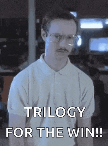 a man with glasses and a mustache is saying " trilogy for the win "