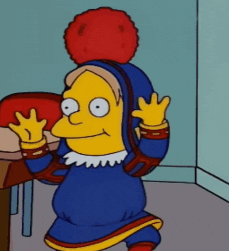 a cartoon character wearing a blue and red outfit
