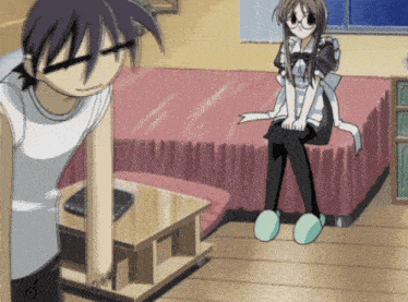 a girl in a maid outfit is sitting on a bed next to a boy