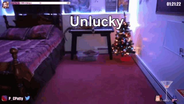 a bedroom with a bed and a christmas tree and the words unlucky on the wall