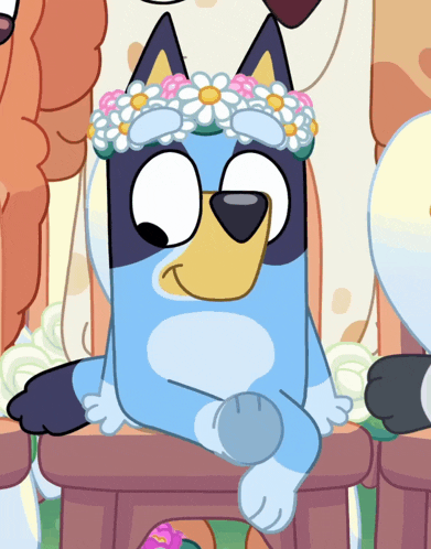a blue dog with a flower crown on its head