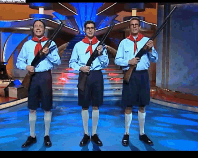 three men are holding guns in front of a screen that says ' hypercam '