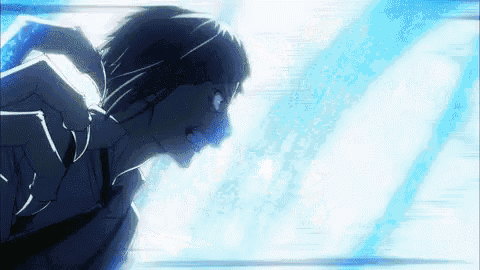 a man in a suit and tie is running in a blue light