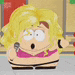 a cartoon character from south park is holding a microphone and singing into it .