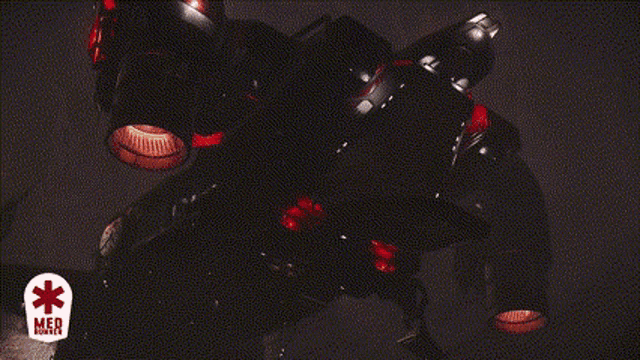 a dark background with a red star and the word med