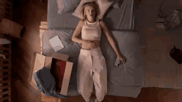 Laying Down Lying On Bed GIF - Laying Down Lying On Bed Spacing Out In Bed GIFs