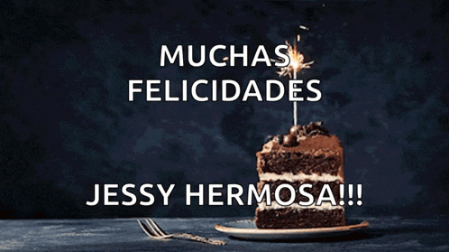 a piece of chocolate cake with a sparkler on top and the words muchas felicidades jessy hermosa !!!